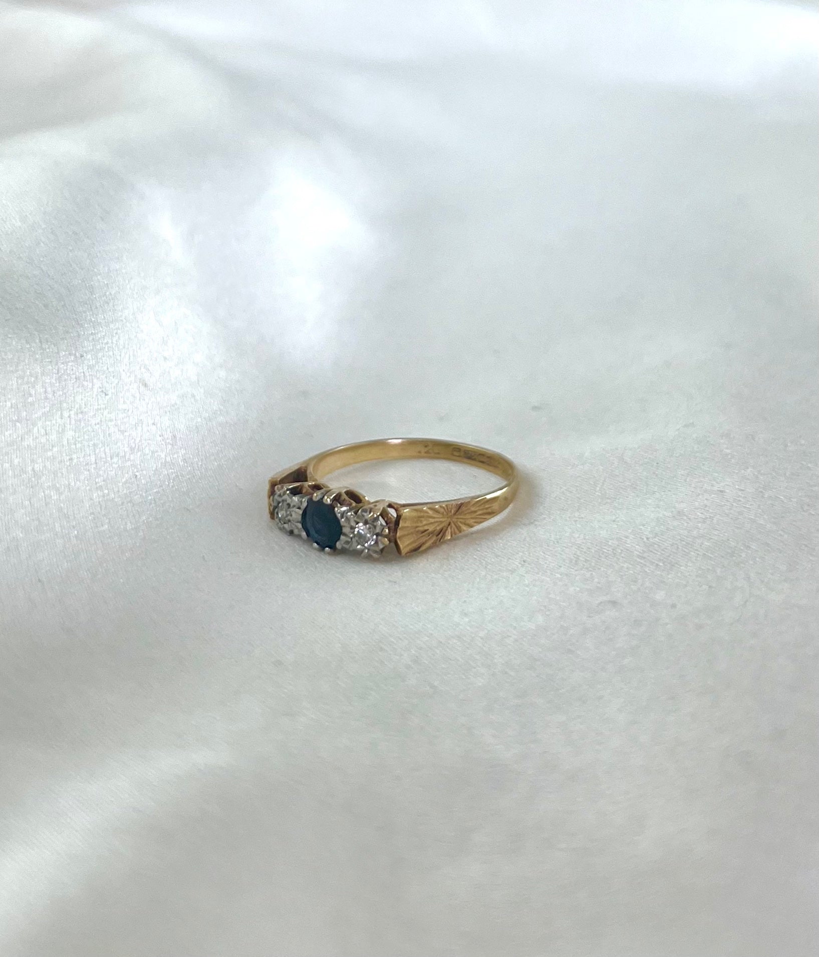 The ring is fully hallmarked and in good condition. This ring is packaged in a Soste hinged ring box.